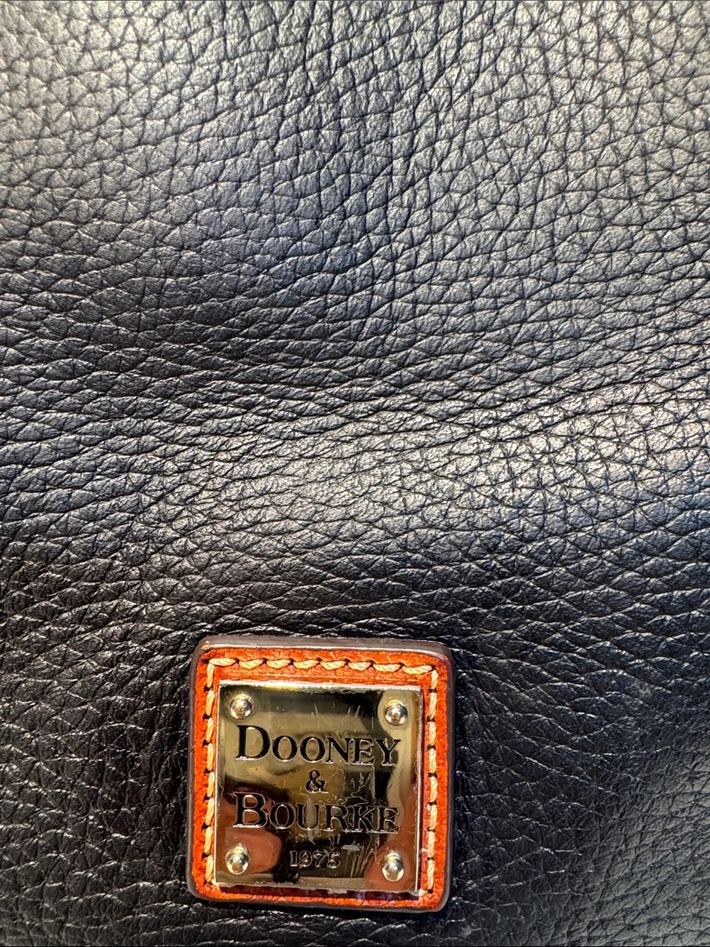 Dooney & Bourke Black Pebbled Leather Tote with Brown Trim & Handles